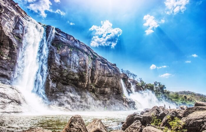 Get drenched under a waterfall Get drenched under a waterfall