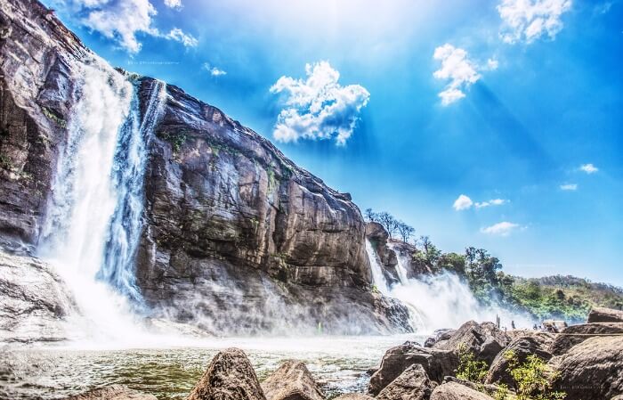 Get drenched under a waterfall