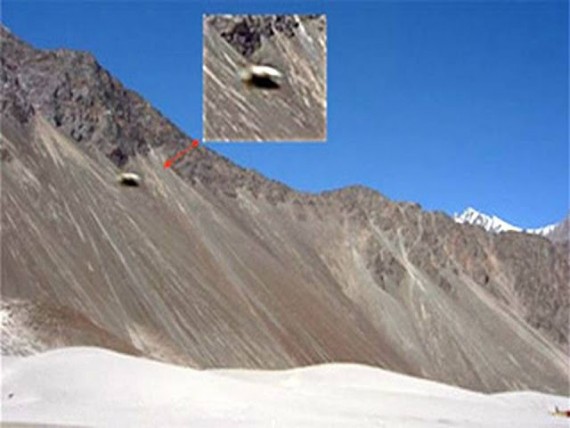 Photograph of UFO that appears to be emerging from a hole in the Kongka La Pass