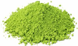 young-woman-making-a-cup-of-green-tea young-woman-making-a-cup-of-green-tea