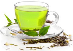 young-woman-making-a-cup-of-green-tea young-woman-making-a-cup-of-green-tea